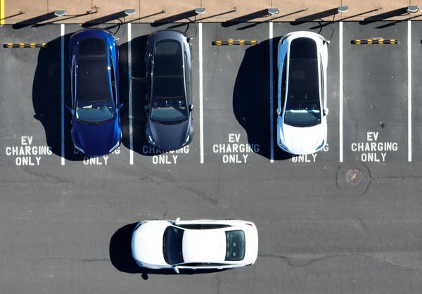 Aerial view of electric cars in charging station